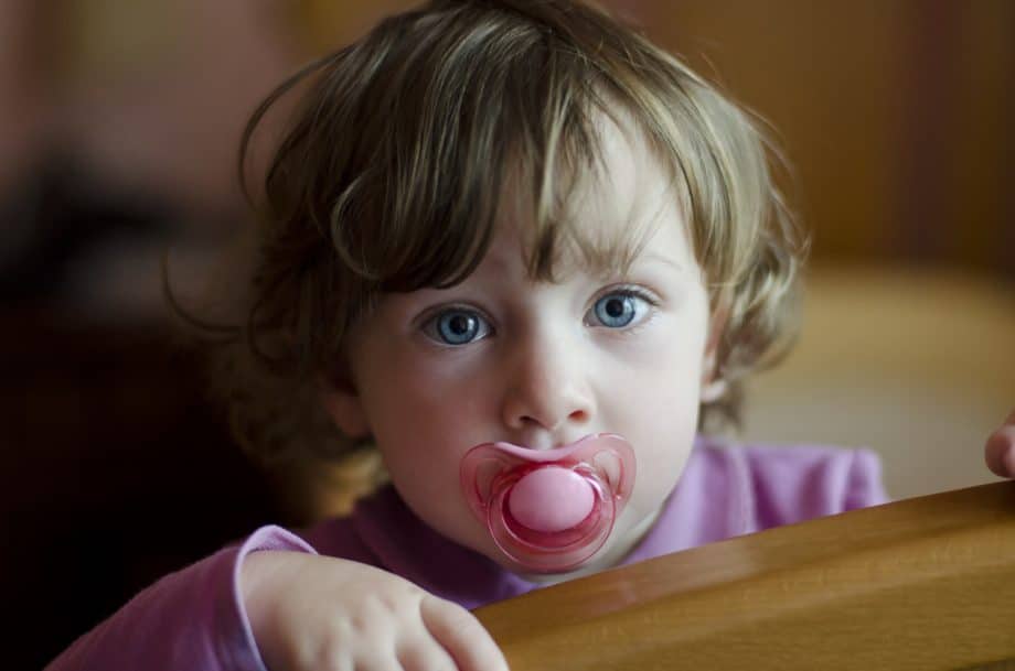 child with pacifier