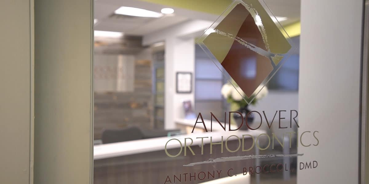 Glass door of entrance to Andover Orthodontics
